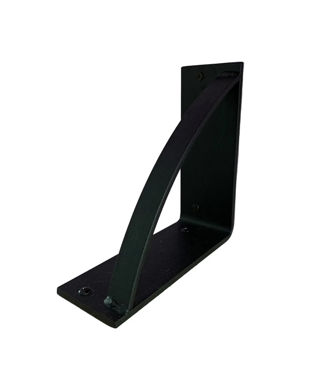 Black metal triangle shelf bracket "The Brie Bookshelf Bracket" by Industrial Farm Co mounted on natural wood against purp...