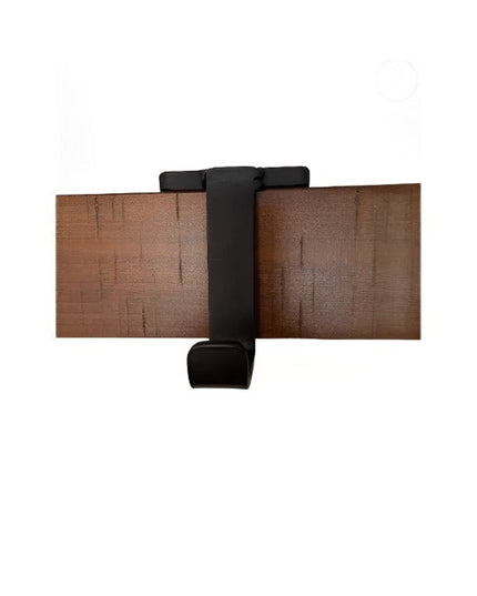 Black metal stocking holder clamp attached to wood surface - The Annie Stocking Holder by Industrial Farm Co