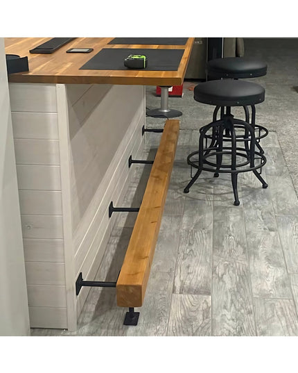 Black metal bar foot rail brackets mounted under wooden kitchen island countertop with industrial bar stools - Industrial ...