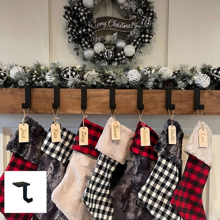 Industrial Farm Co Annie Stocking Holder in natural wood with black metal hooks displaying Christmas stockings and garland