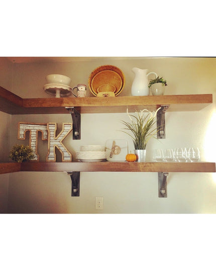 The Butch Shelf Supports by Industrial Farm Co holding rustic wood shelves with kitchen dishes and decor in farmhouse style
