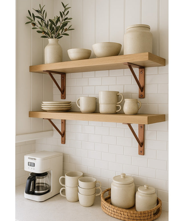 Middletown L Shelf Support brackets in copper finish holding natural wood shelves with beige ceramic dishes and mugs in mo...