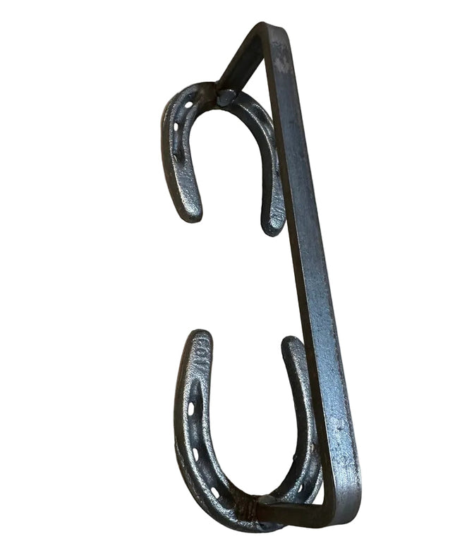 Black wrought iron horseshoe door handle by Industrial Farm Co, featuring rustic Chincoteague Pony Shoe design with curved...