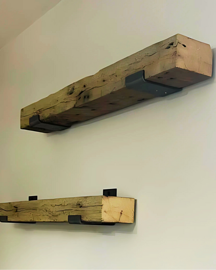 Two wooden shelves mounted on a white wall.