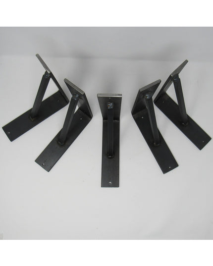 Set of five black metal Oneida shelf brackets by Industrial Farm Co arranged on white background, showing triangular indus...