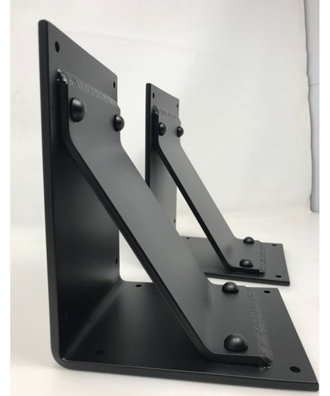 Black metal Parish Style Bracket Supports by Industrial Farm Co, two triangular wall-mounted shelf brackets with decorativ...