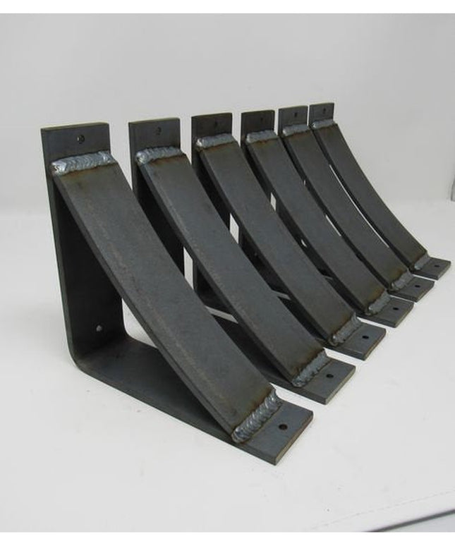 Set of six black metal curved countertop support brackets by Industrial Farm Co, showing welded steel construction with mo...