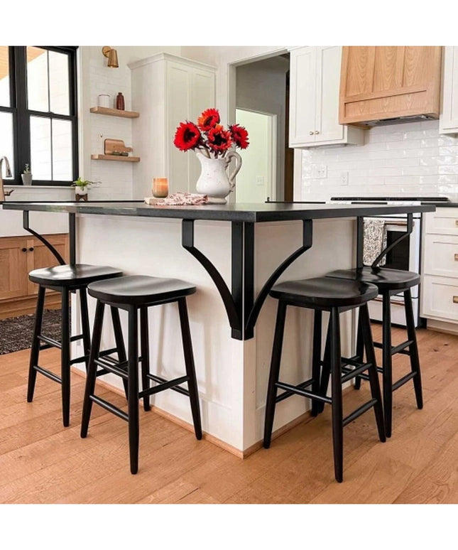 Black metal Syracuse countertop support brackets by Industrial Farm Co holding up dark kitchen island with bar stools in m...