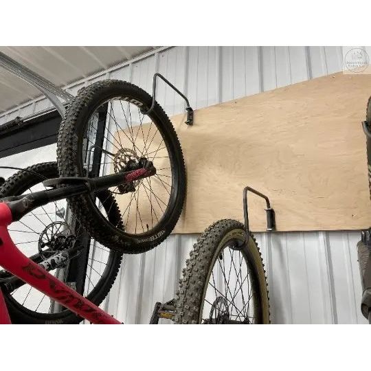 The Logan Wall Mounted Bike Rack Hook Fat Bike Rim Finish Bare/Raw Metal | Industrial Farm Co
